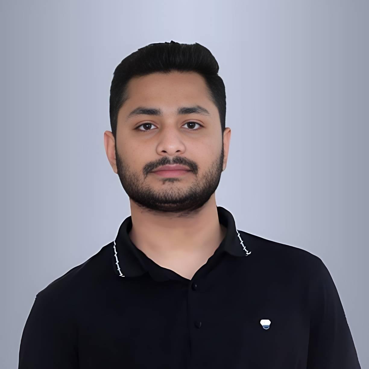 Toufiq reviewing SEO performance data at a desk